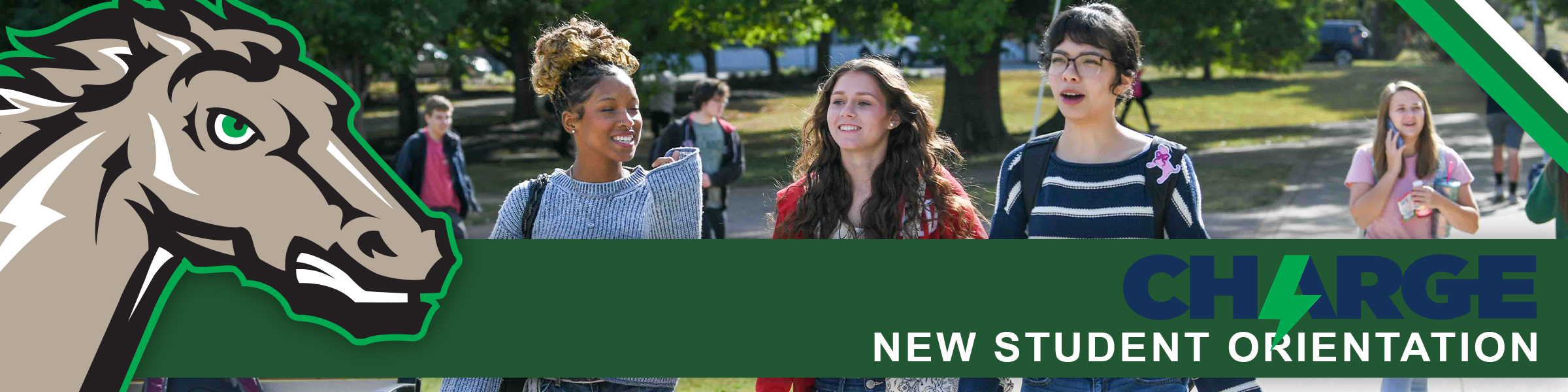 3 students sitting outside